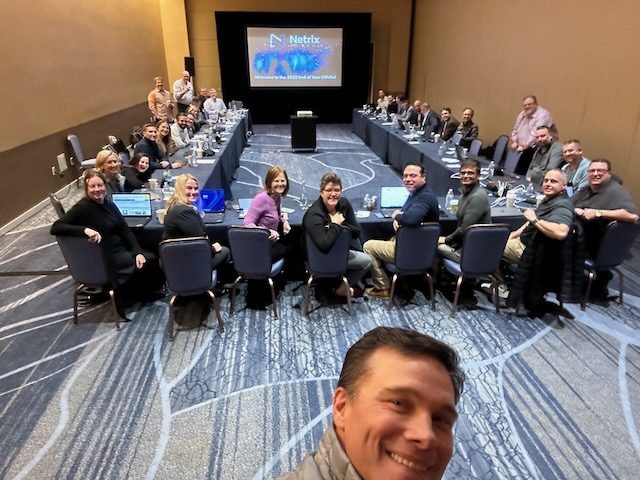 Russ Reeder with the Netrix Global leadership team